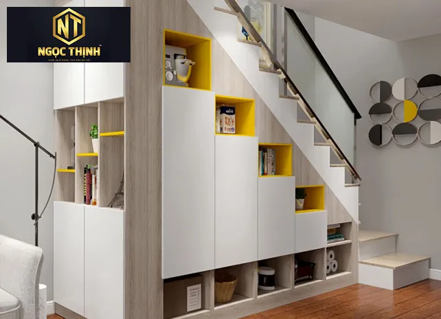 Xưởng Nội Thất Ngọc Thịnh Long Thành - Biên Hòa - Tủ đựng đồ dưới gầm cầu thang giúp tối ưu không gian hiệu quả.